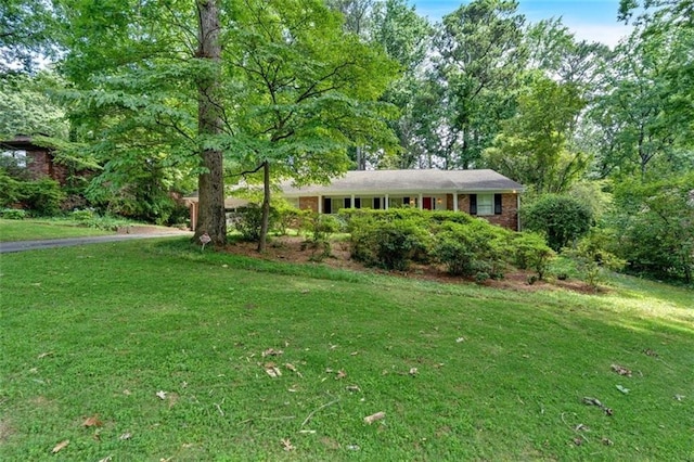 1618 Mason Mill Rd NE, Atlanta, GA 30329 - ranch-style home with a front yard and brick siding