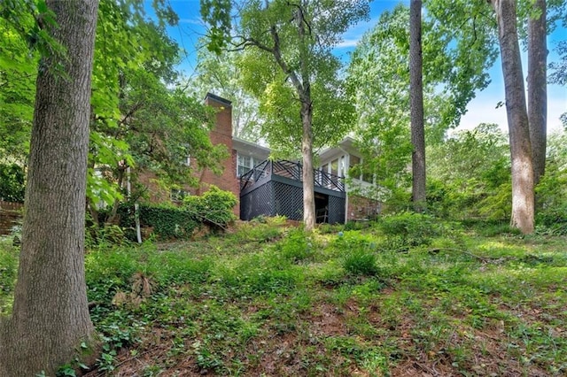 1618 Mason Mill Rd NE, Atlanta, GA 30329 - view of yard with a deck