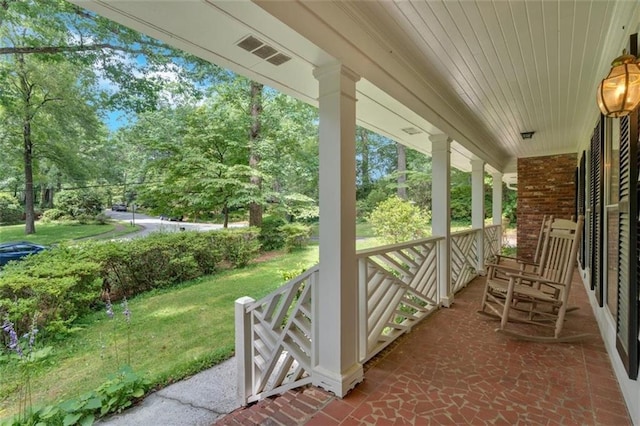 1618 Mason Mill Rd NE, Atlanta, GA 30329 - porch with view of scattered trees and a lawn