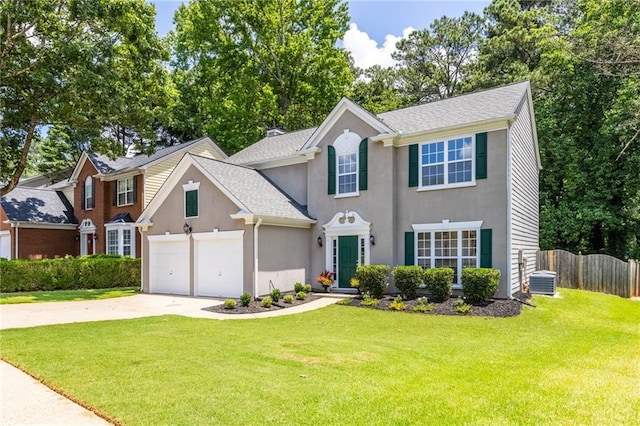 7000 Foxberry Ln, Roswell, GA 30075 - colonial home with concrete driveway, stucco siding, a shingled roof, and an attached garage
