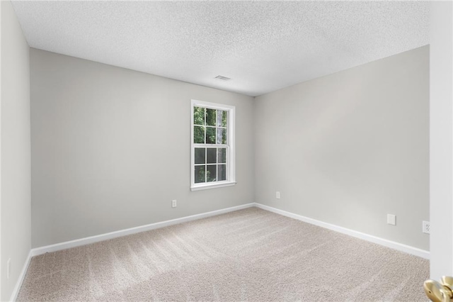 7000 Foxberry Ln, Roswell, GA 30075 - unfurnished room with carpet flooring and a textured ceiling