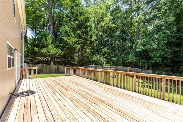 7000 Foxberry Ln, Roswell, GA 30075 - wooden terrace featuring a fenced backyard and view of scattered trees