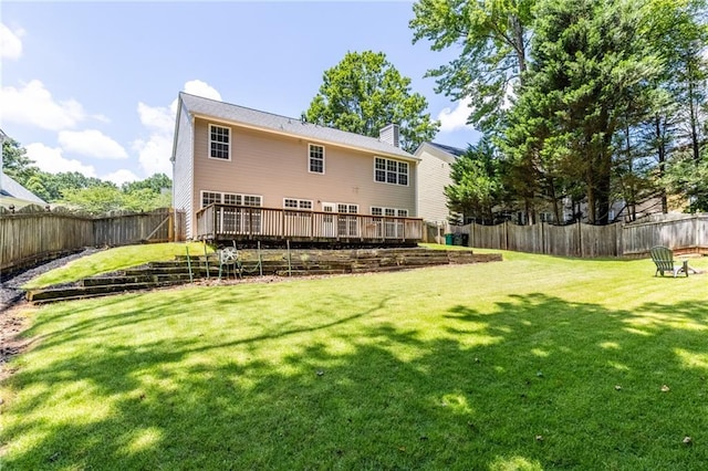 7000 Foxberry Ln, Roswell, GA 30075 - back of property with a fenced backyard, a wooden deck, and a chimney