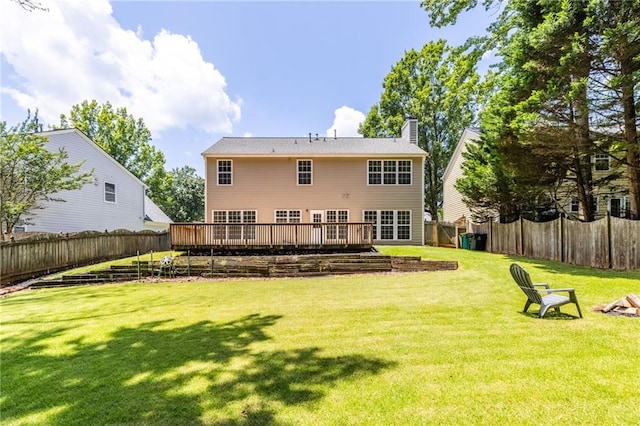 7000 Foxberry Ln, Roswell, GA 30075 - back of house featuring a fenced backyard, a wooden deck, and a chimney
