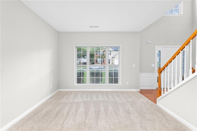 7000 Foxberry Ln, Roswell, GA 30075 - carpeted empty room featuring stairs and baseboards