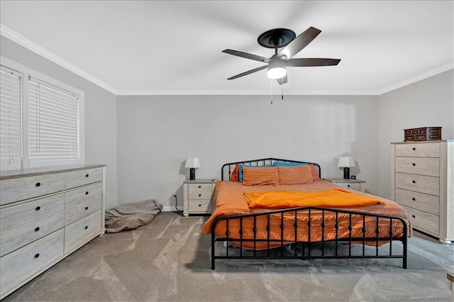 bedroom featuring carpet, ceiling fan, and crown molding