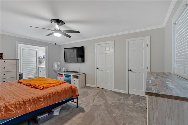 bedroom with connected bathroom, ceiling fan, light carpet, and ornamental molding