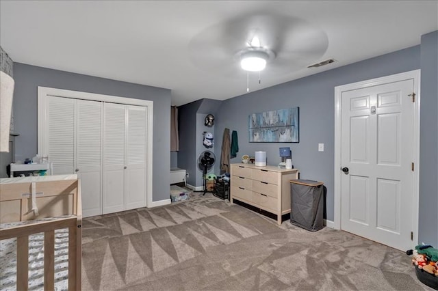 carpeted bedroom with ceiling fan