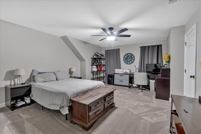 bedroom featuring light colored carpet and ceiling fan