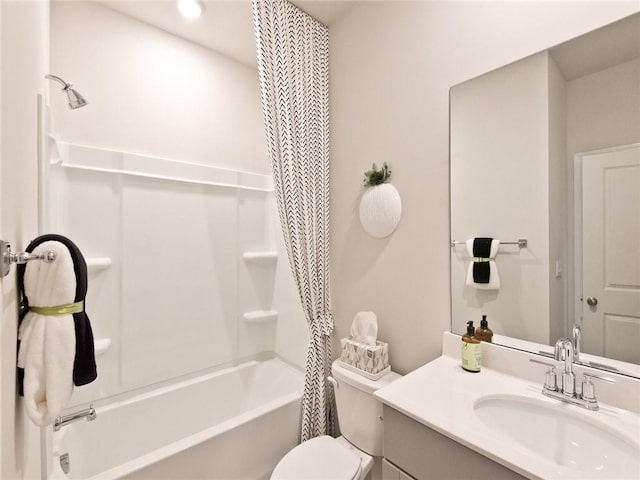 bathroom with vanity, toilet, and shower / tub combo with curtain