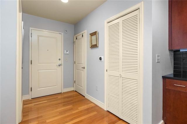 44 Peachtree Pl NE Unit 1824, Atlanta, GA 30309 - hall with light wood-style floors and baseboards