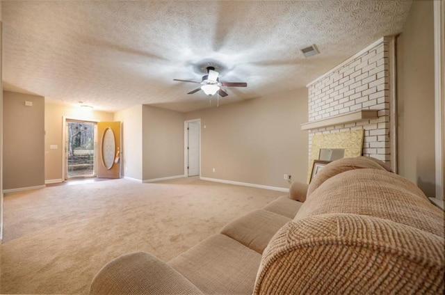 living area with carpet, a fireplace, visible vents, ceiling fan, and baseboards