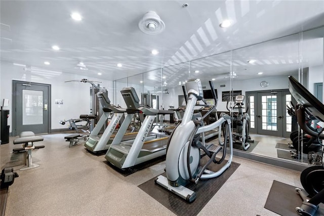 workout area with recessed lighting and french doors