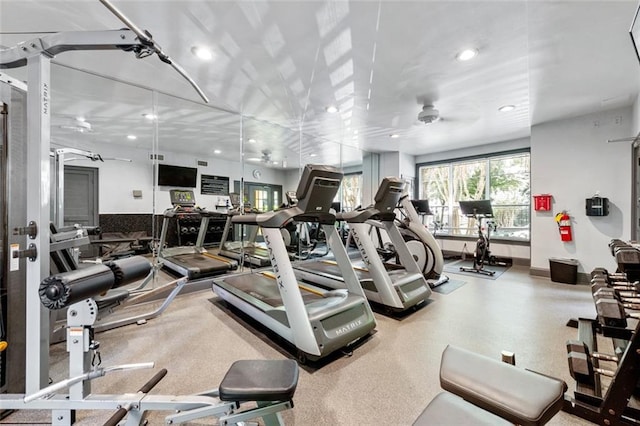 exercise room featuring recessed lighting and baseboards