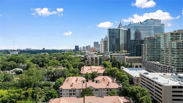 birds eye view of property with a city view