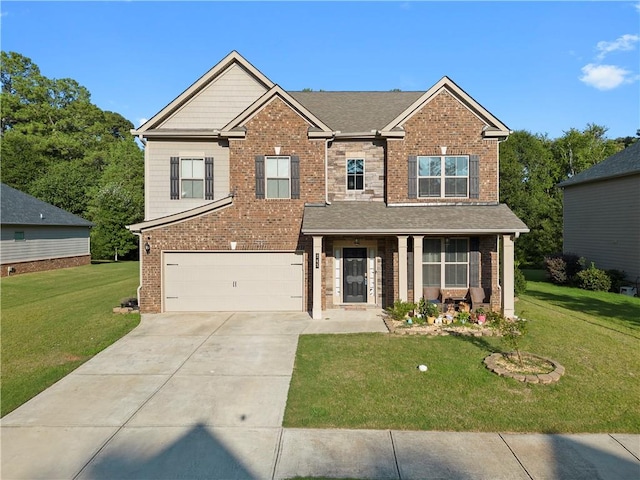 craftsman-style home with a front yard and a garage