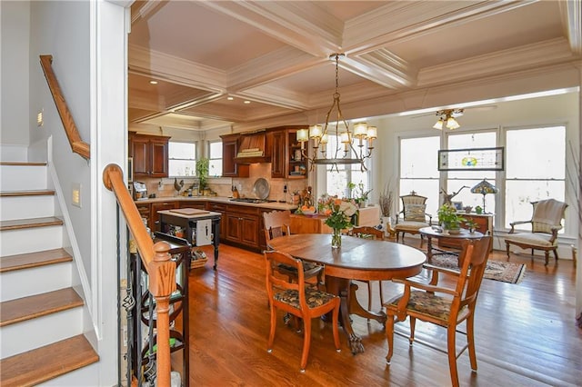 dining area with stairway, dark wood-style flooring, crown molding, and beamed ceiling