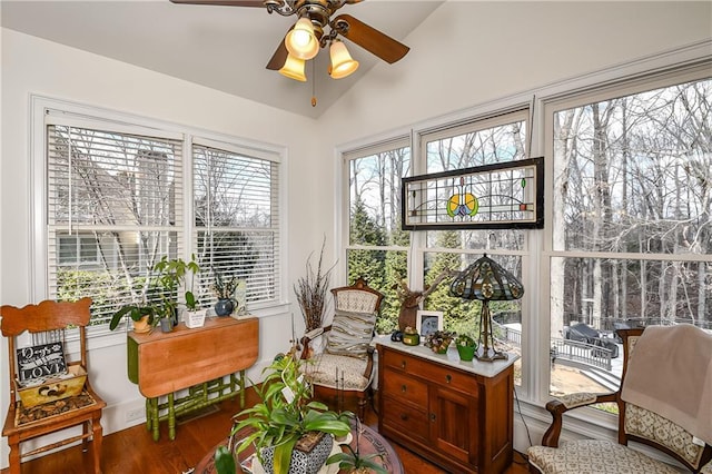 sunroom with vaulted ceiling and ceiling fan