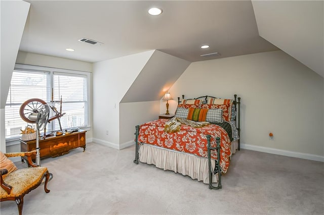 carpeted bedroom with recessed lighting, vaulted ceiling, baseboards, and visible vents