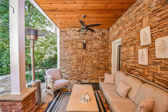 view of patio with an outdoor hangout area and a ceiling fan