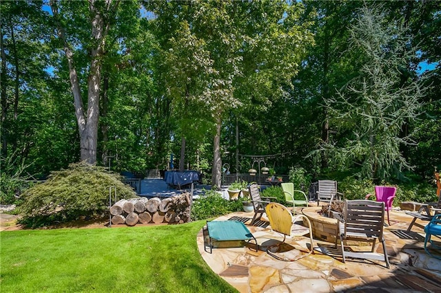 view of patio with an outdoor fire pit