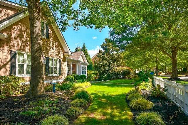 view of yard with fence