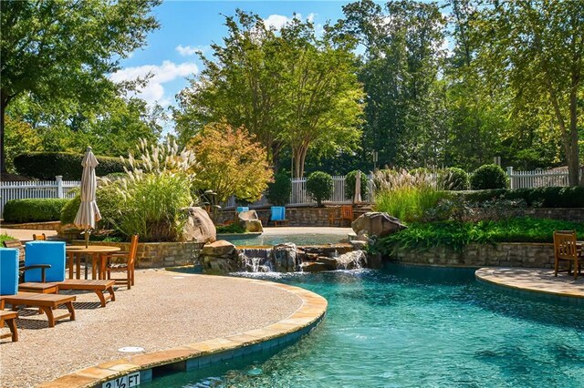 view of pool with fence, a patio, and a fenced in pool