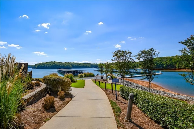 view of home's community with a water view