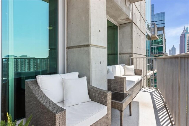 943 Peachtree St NE Unit 1910, Atlanta, GA 30309 - balcony with a view of city and an outdoor living space