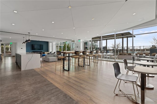 943 Peachtree St NE Unit 1910, Atlanta, GA 30309 - dining room with floor to ceiling windows, wood finished floors, and recessed lighting