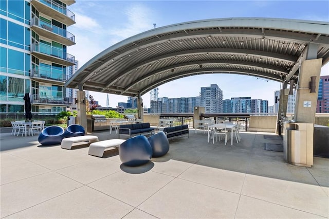 943 Peachtree St NE Unit 1910, Atlanta, GA 30309 - view of property's community with a view of city and outdoor dining space