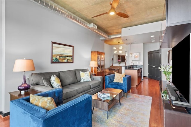 943 Peachtree St NE Unit 1910, Atlanta, GA 30309 - living area featuring dark wood-style floors and a ceiling fan