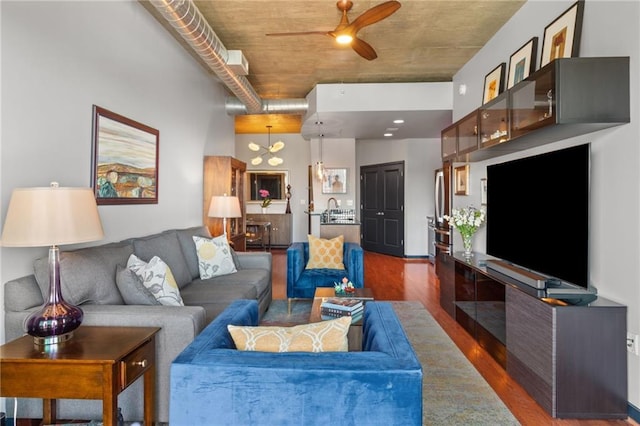 943 Peachtree St NE Unit 1910, Atlanta, GA 30309 - living room featuring a ceiling fan and wood finished floors