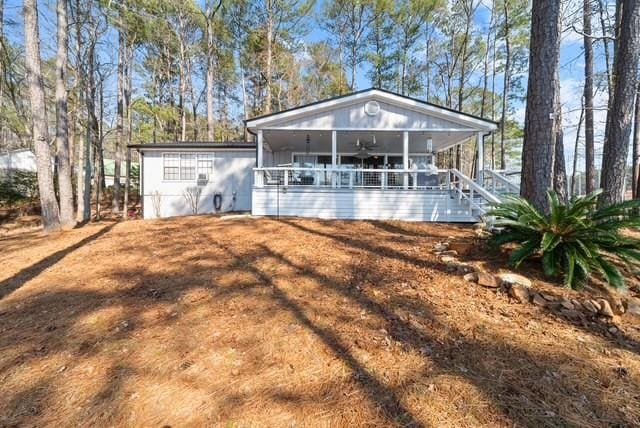 view of front of house with a ceiling fan