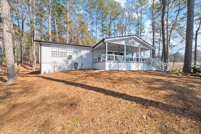 433 Dwain Ball Rd, Sparta, GA 31087 - view of front of house featuring stairway