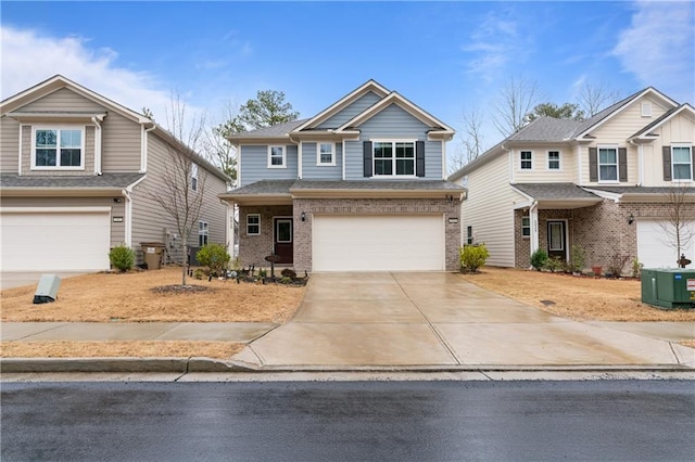 view of front of home featuring a garage, central air condition unit, brick siding, and concrete driveway