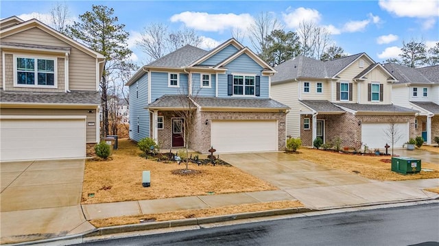 craftsman-style home with driveway, cooling unit, an attached garage, a shingled roof, and brick siding