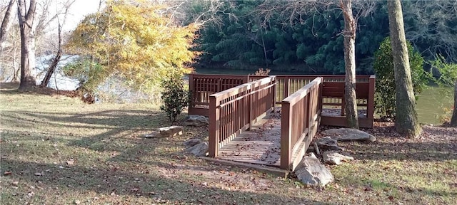 surrounding community featuring a wooded view