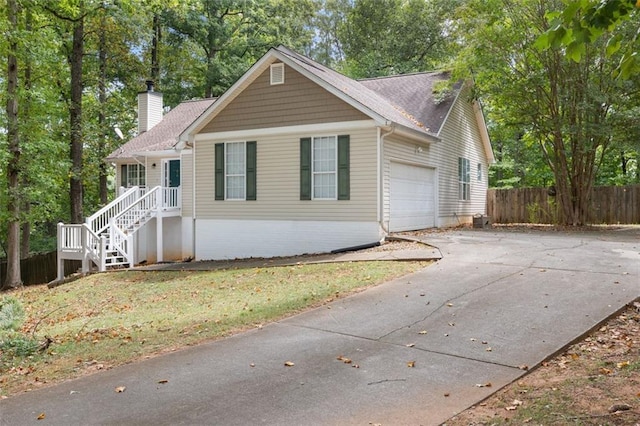 single story home with a garage