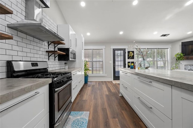 3313 Harmon Ridge Ct, Buford, GA 30519 - kitchen with open shelves, stainless steel appliances, wall chimney exhaust hood, recessed lighting, and tasteful backsplash