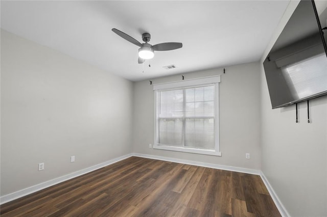 3313 Harmon Ridge Ct, Buford, GA 30519 - unfurnished room with baseboards, a ceiling fan, and wood finished floors