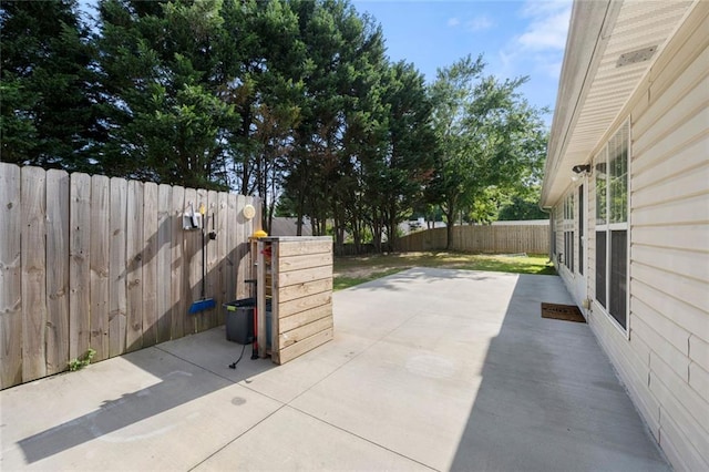 3313 Harmon Ridge Ct, Buford, GA 30519 - fenced backyard featuring a patio area