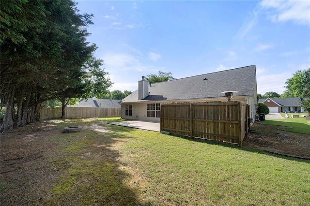 3313 Harmon Ridge Ct, Buford, GA 30519 - back of house with an outdoor fire pit, a patio area, and a chimney