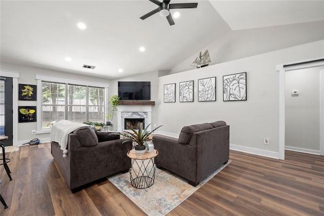 3313 Harmon Ridge Ct, Buford, GA 30519 - living area with a ceiling fan, a premium fireplace, vaulted ceiling, recessed lighting, and baseboards