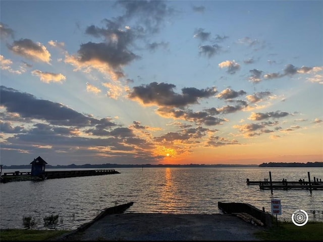 view of dock with a water view