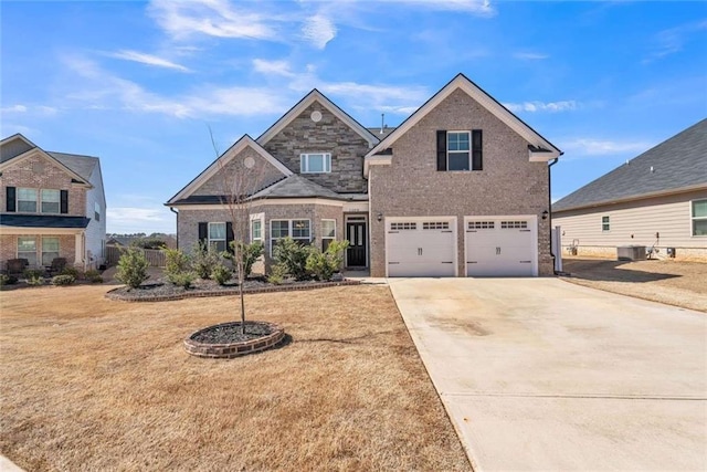 view of front facade with driveway, central AC unit, an attached garage, a front lawn, and brick siding