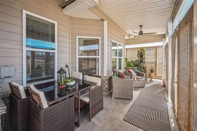 view of patio featuring an outdoor hangout area and a ceiling fan