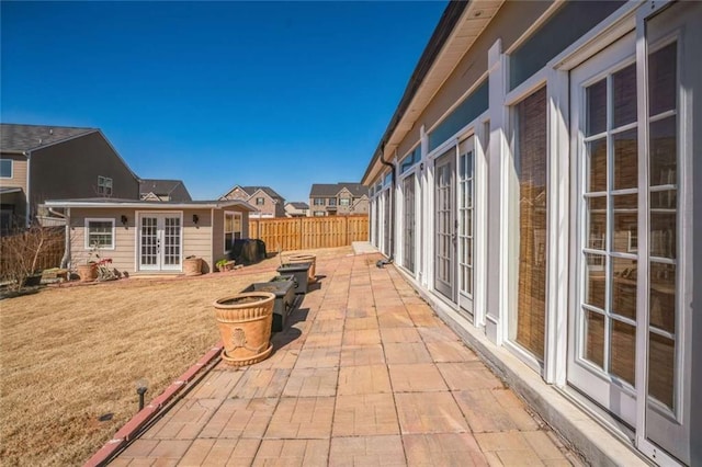 view of patio with fence and french doors