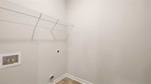 laundry area featuring hookup for an electric dryer and hookup for a washing machine