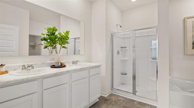 bathroom with separate shower and tub and vanity